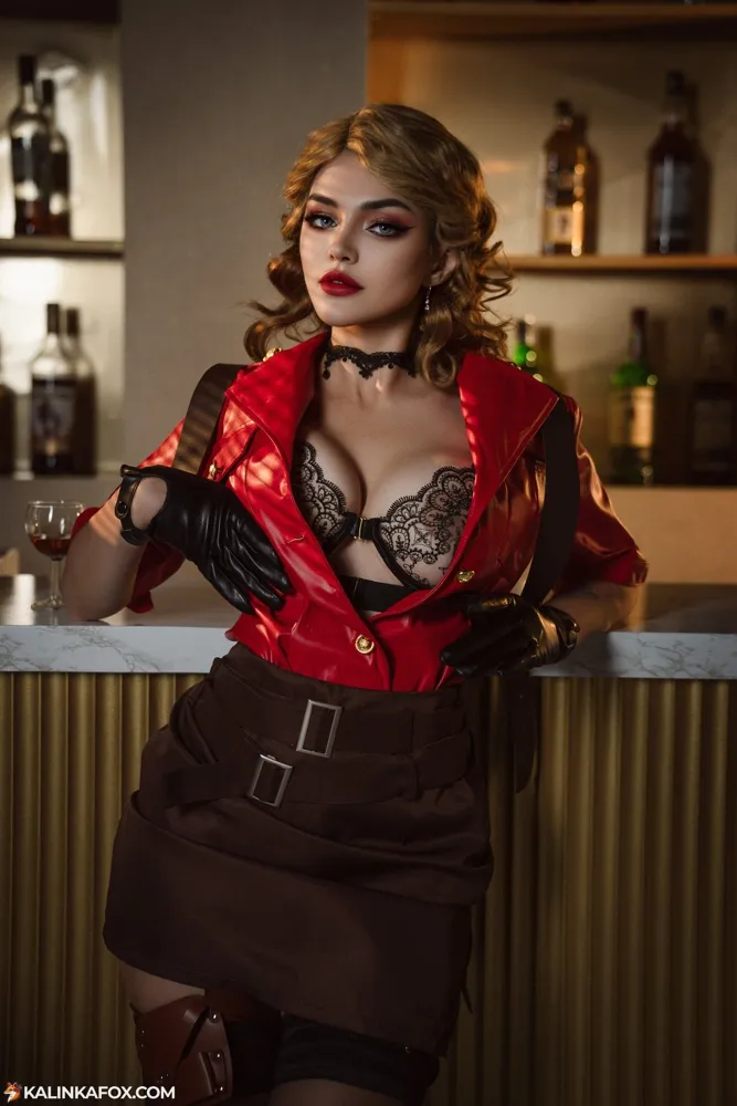 Kalinka Fox as Katherine in a red leather jacket