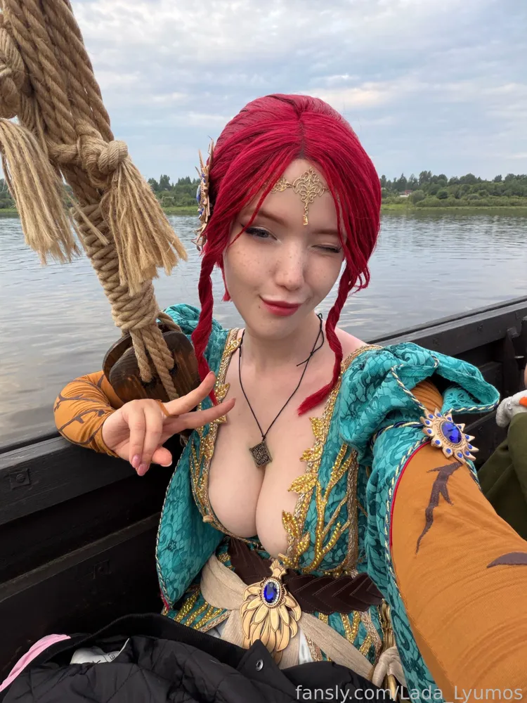 Lada Lyumos with red hair, selfie on a boat