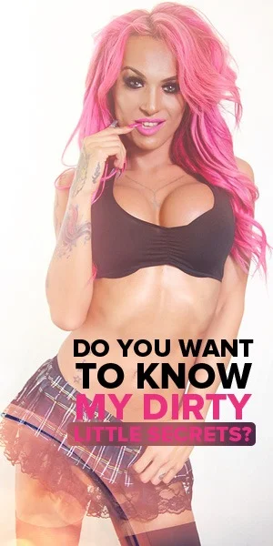 Mia Maffia with pink hair in a black sports bra and plaid skirt, official banner